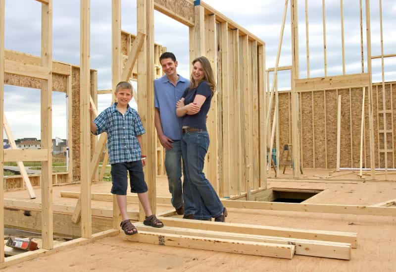 Family in a new home construction